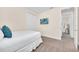 Bedroom with a full bed and view of another room at 611 Lasso Dr, Kissimmee, FL 34747