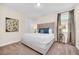 Spacious bedroom with king-size bed and neutral decor at 611 Lasso Dr, Kissimmee, FL 34747