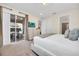 King-size bed, private patio access, and dresser at 611 Lasso Dr, Kissimmee, FL 34747