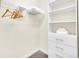 Walk in closet with shelving and hanging rods at 611 Lasso Dr, Kissimmee, FL 34747