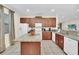Kitchen with granite countertops and stainless steel appliances at 611 Lasso Dr, Kissimmee, FL 34747