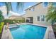 Inviting pool and spa with ample deck space at 611 Lasso Dr, Kissimmee, FL 34747