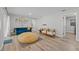Bright Gathering room with comfy seating and wood floors at 6829 Bittersweet Ln, Orlando, FL 32819
