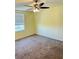 Spacious bedroom with ceiling fan and neutral carpeting at 10118 Storey Grove Way, Winter Garden, FL 34787