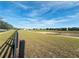 Community view showcasing open green space and homes at 10118 Storey Grove Way, Winter Garden, FL 34787