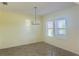 Bright dining room with tile flooring and chandelier at 10118 Storey Grove Way, Winter Garden, FL 34787