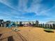 playground with slides, climbing structures, and a spinner at 10118 Storey Grove Way, Winter Garden, FL 34787