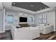 Spacious living room with sectional sofa and unique wall decor at 1104 Western Blue Way, Minneola, FL 34715