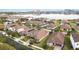 Stunning aerial view of lakefront homes and community at 11637 Meadow Grove Cir, Orlando, FL 32836