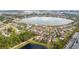 Wide aerial view of lakefront community at 11637 Meadow Grove Cir, Orlando, FL 32836