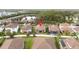 Aerial view of a single Gathering home in a residential neighborhood at 11637 Meadow Grove Cir, Orlando, FL 32836