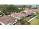 Aerial view of house and backyard with pool and trampoline at 11637 Meadow Grove Cir, Orlando, FL 32836