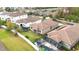 Aerial view showing home's backyard with pool at 11637 Meadow Grove Cir, Orlando, FL 32836