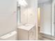 Simple bathroom with a single sink vanity and toilet at 11637 Meadow Grove Cir, Orlando, FL 32836