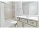 Clean bathroom with a shower/tub combo and white vanity at 11637 Meadow Grove Cir, Orlando, FL 32836