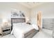 Main bedroom with ensuite access and walk-in closet at 11637 Meadow Grove Cir, Orlando, FL 32836