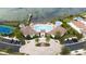 Resort-style community pool with tennis courts and lake views at 11637 Meadow Grove Cir, Orlando, FL 32836