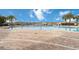 Resort-style pool with brick patio and lounge chairs at 11637 Meadow Grove Cir, Orlando, FL 32836