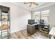 Spacious home office with built-in shelving and large window at 11637 Meadow Grove Cir, Orlando, FL 32836