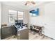 Home office with wood flooring and ample workspace at 11637 Meadow Grove Cir, Orlando, FL 32836