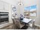 Bright kitchen features stainless steel appliances and an eat-in dining area at 11637 Meadow Grove Cir, Orlando, FL 32836