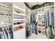 Large walk-in closet with ample shelving and hanging space at 11637 Meadow Grove Cir, Orlando, FL 32836