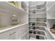 Spacious walk-in closet with ample shelving and drawers at 11637 Meadow Grove Cir, Orlando, FL 32836
