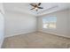 Bright bedroom with carpeted floor and ceiling fan at 14537 Golden Harbor Ln, Winter Garden, FL 34787