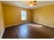 Bedroom with hardwood floors and a window at 152 Dakota Ave, Groveland, FL 34736