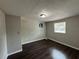 Another bedroom with dark hardwood floors and a window at 2341 Broadway St, Sanford, FL 32771