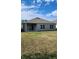 Spacious backyard with grassy lawn at 3509 Yarian Dr, Haines City, FL 33844