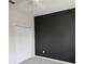 Bedroom with gray accent wall and double door closet at 3509 Yarian Dr, Haines City, FL 33844