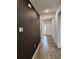 Dark-walled entryway with tile floor and front door view at 3509 Yarian Dr, Haines City, FL 33844