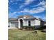 One-story home with attached garage and landscaped lawn at 3509 Yarian Dr, Haines City, FL 33844