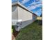 Side view of house showcasing stone accents at 3509 Yarian Dr, Haines City, FL 33844
