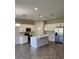 Modern kitchen with white cabinets and island at 3509 Yarian Dr, Haines City, FL 33844