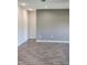 Bright living room with neutral walls and wood-look tile floors at 3509 Yarian Dr, Haines City, FL 33844
