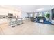 Modern kitchen with white cabinets and a breakfast bar at 664 Benoi Dr, Davenport, FL 33896