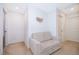 Upstairs landing with comfortable loveseat at 664 Benoi Dr, Davenport, FL 33896
