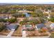 House with pool in a residential neighborhood with a pond nearby at 6928 Sugarbush Dr, Orlando, FL 32819