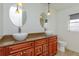 Bathroom with double vanity and granite countertop at 6928 Sugarbush Dr, Orlando, FL 32819