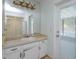 Bathroom boasts a single sink vanity, shower, and access to the pool at 6928 Sugarbush Dr, Orlando, FL 32819