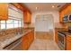 Updated kitchen featuring granite countertops and stainless steel appliances at 6928 Sugarbush Dr, Orlando, FL 32819