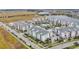 Aerial view of community and lake at 7517 Laureate Blvd # 4205, Orlando, FL 32827