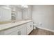 Double vanity bathroom with tile flooring and shower at 7517 Laureate Blvd # 4205, Orlando, FL 32827