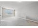 Main bedroom with plush bedding and view of city at 7517 Laureate Blvd # 4205, Orlando, FL 32827