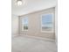 Bright bedroom with neutral walls and carpet flooring at 7517 Laureate Blvd # 4205, Orlando, FL 32827