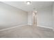 Spacious bedroom with neutral walls and carpet flooring at 7517 Laureate Blvd # 4205, Orlando, FL 32827