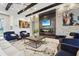 Community room with fireplace, seating area, and modern decor at 7517 Laureate Blvd # 4205, Orlando, FL 32827