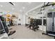 Well-equipped fitness center with weight machines and cardio equipment at 7517 Laureate Blvd # 4205, Orlando, FL 32827